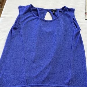 Woman’s top Jones New York in blue.